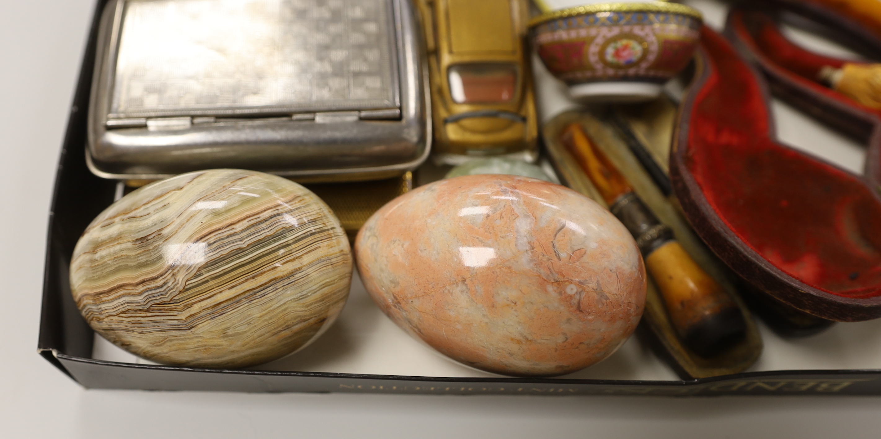 A group of mixed collectables including a Corgi James Bond Aston Martin DB, smoking pipes etc.